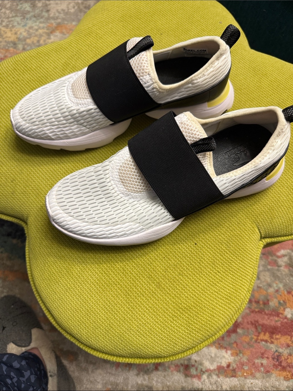 Sorel White Mesh Slip-On Sneakers with Black Strap and Yellow Accent